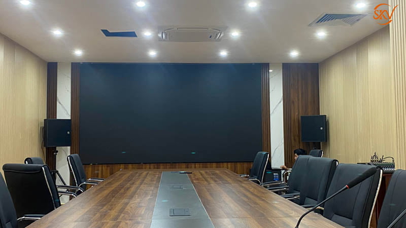 a room with a large screen